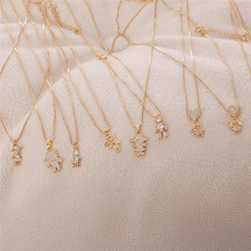 PINGENTE MENINO CRAVEJADO BANHADO OURO