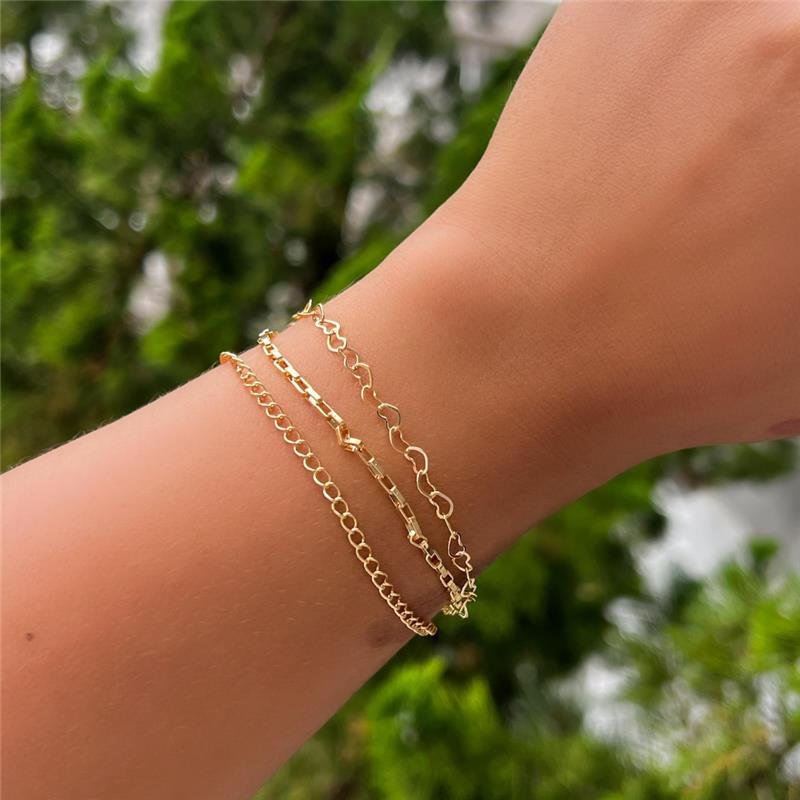 PULSEIRA TRIPLA CORAÇÃO FOLHEADO OURO