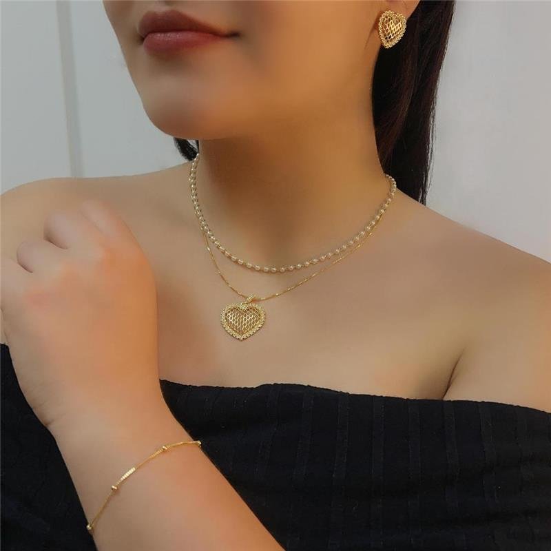 PULSEIRA BOLINHAS BANHADO OURO