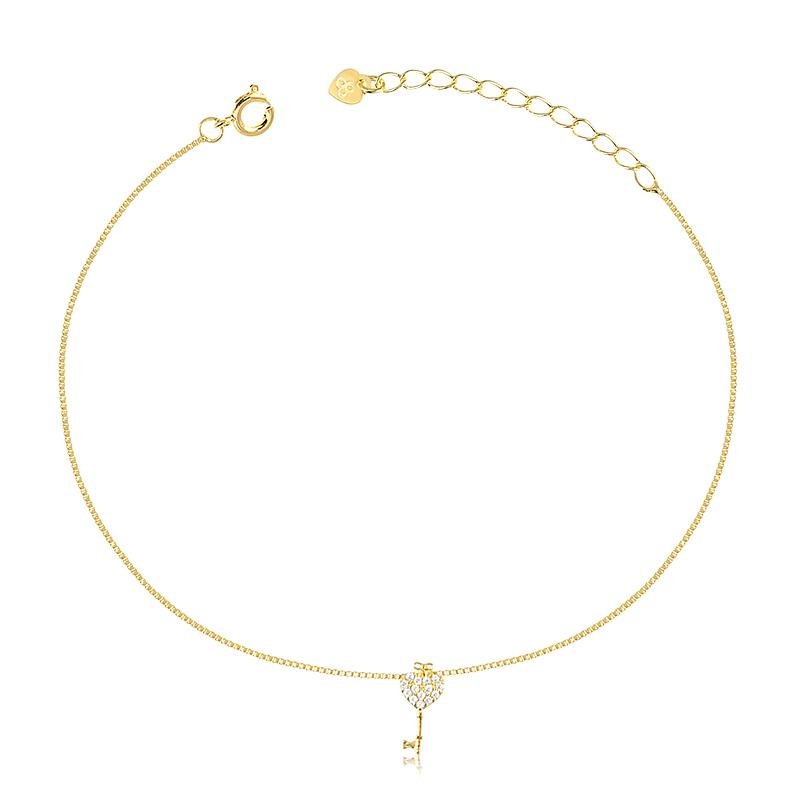 TORNOZELEIRA CHAVE CRAVEJADA BANHADO OURO - CRISTAL