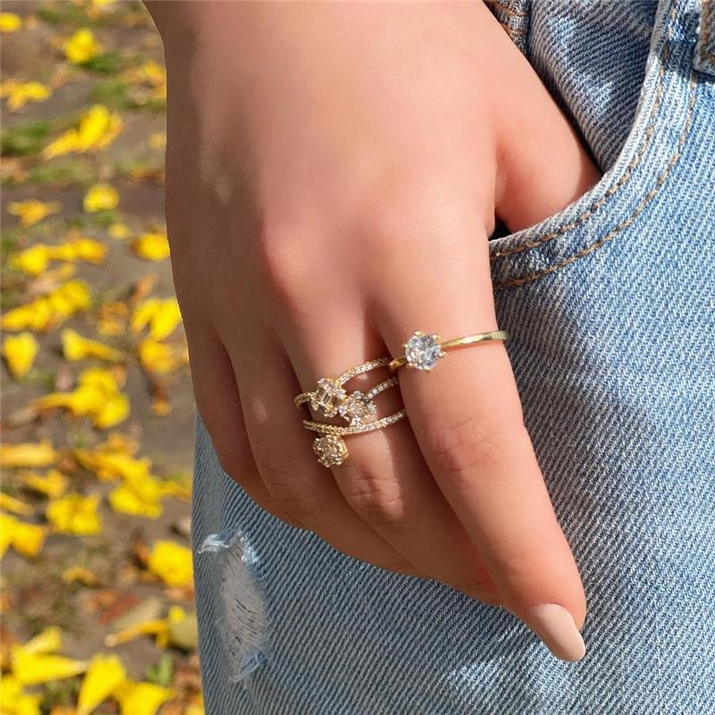 ANEL COM ZIRCONIAS FOLHEADO OURO