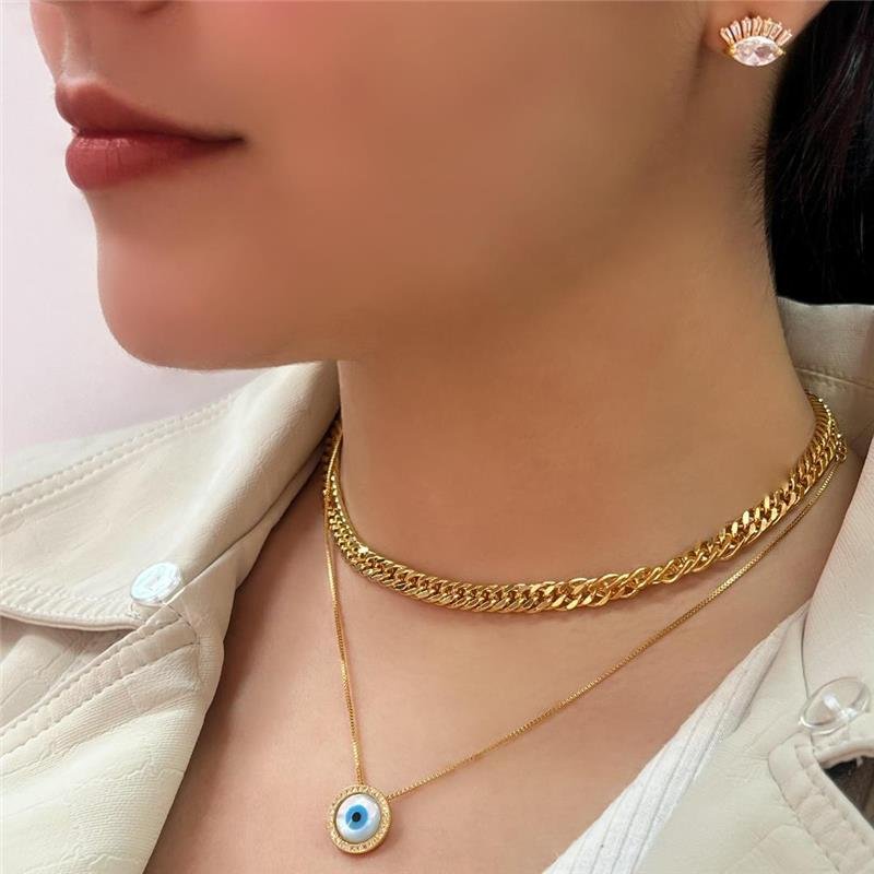 BRINCO OLHO GREGO COM ZIRCONIAS FOLH. OURO 