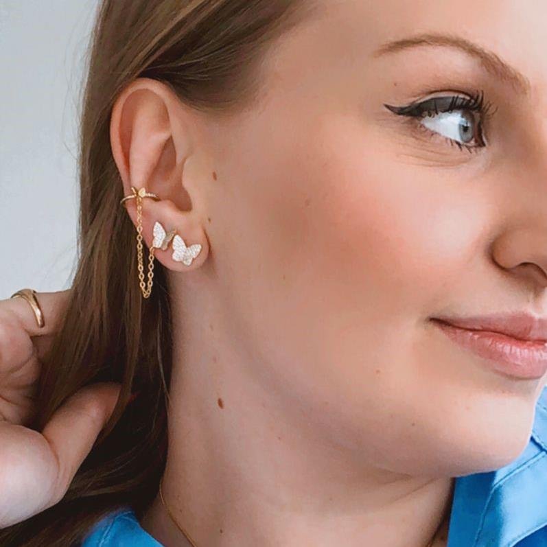 BRINCO BORBOLETA COM PIERCING FAKE CRAVEJADO FOLH. OURO 