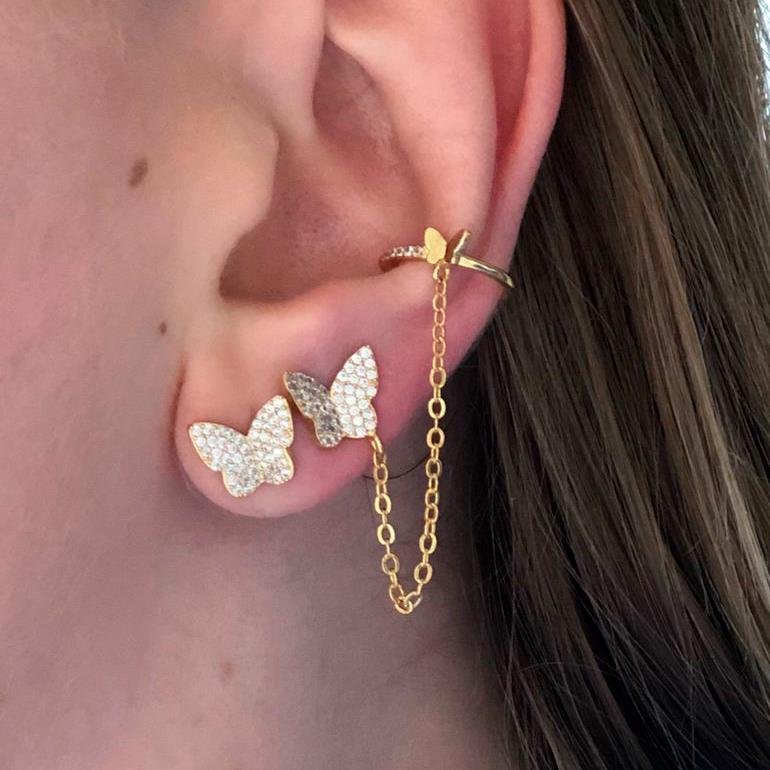 BRINCO BORBOLETA COM PIERCING FAKE CRAVEJADO FOLH. OURO 