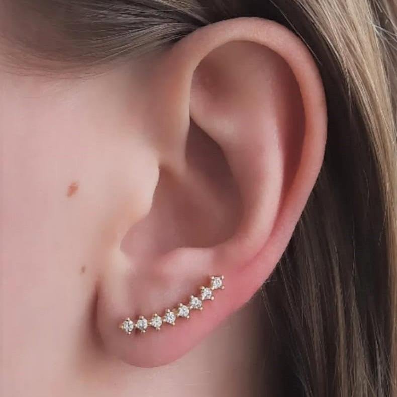 BRINCO MEIA LUA ZIRCONIAS CRAVEJAS FOLH. OURO 