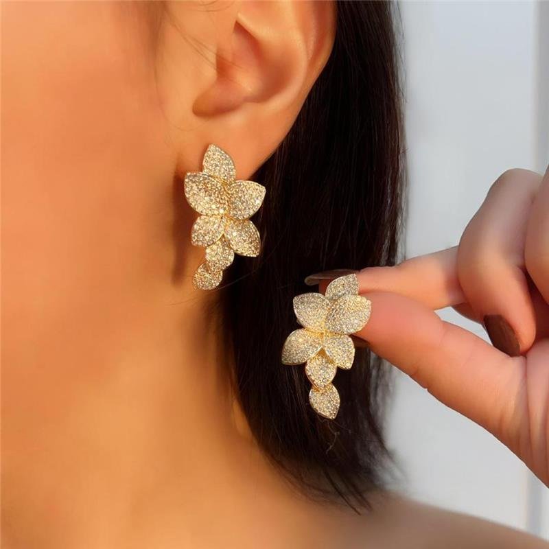 BRINCO FOLHAS CRAVEJADAS BANHADO OURO